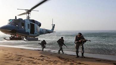 مناورات عسكرية إيرانية أجريت في 7 نوفمبر الماضي، على البحر الأحمر (أ ف ب)